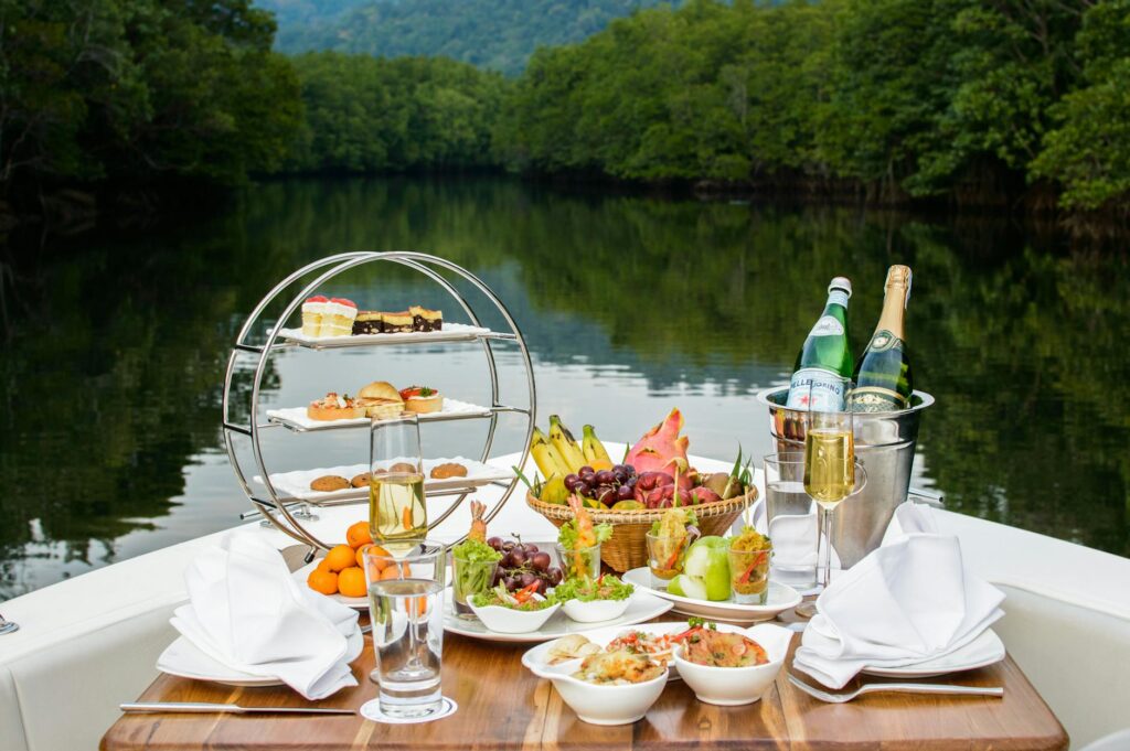 Enjoy a sumptuous riverside dining experience with diverse culinary delights and a serene view in Thailand.